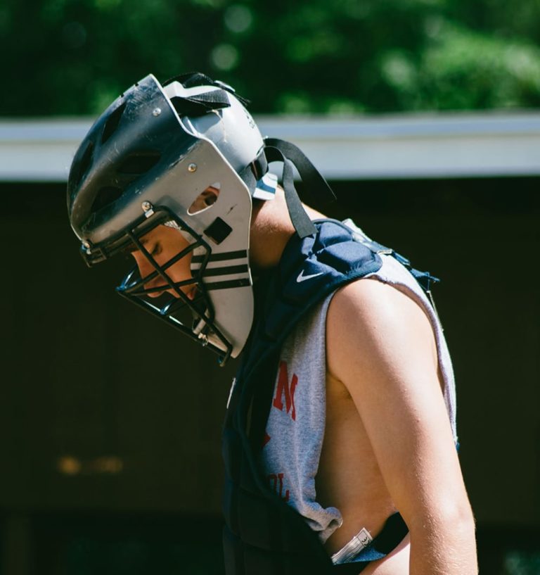 catcher-looking-down-baseball-cobbossee