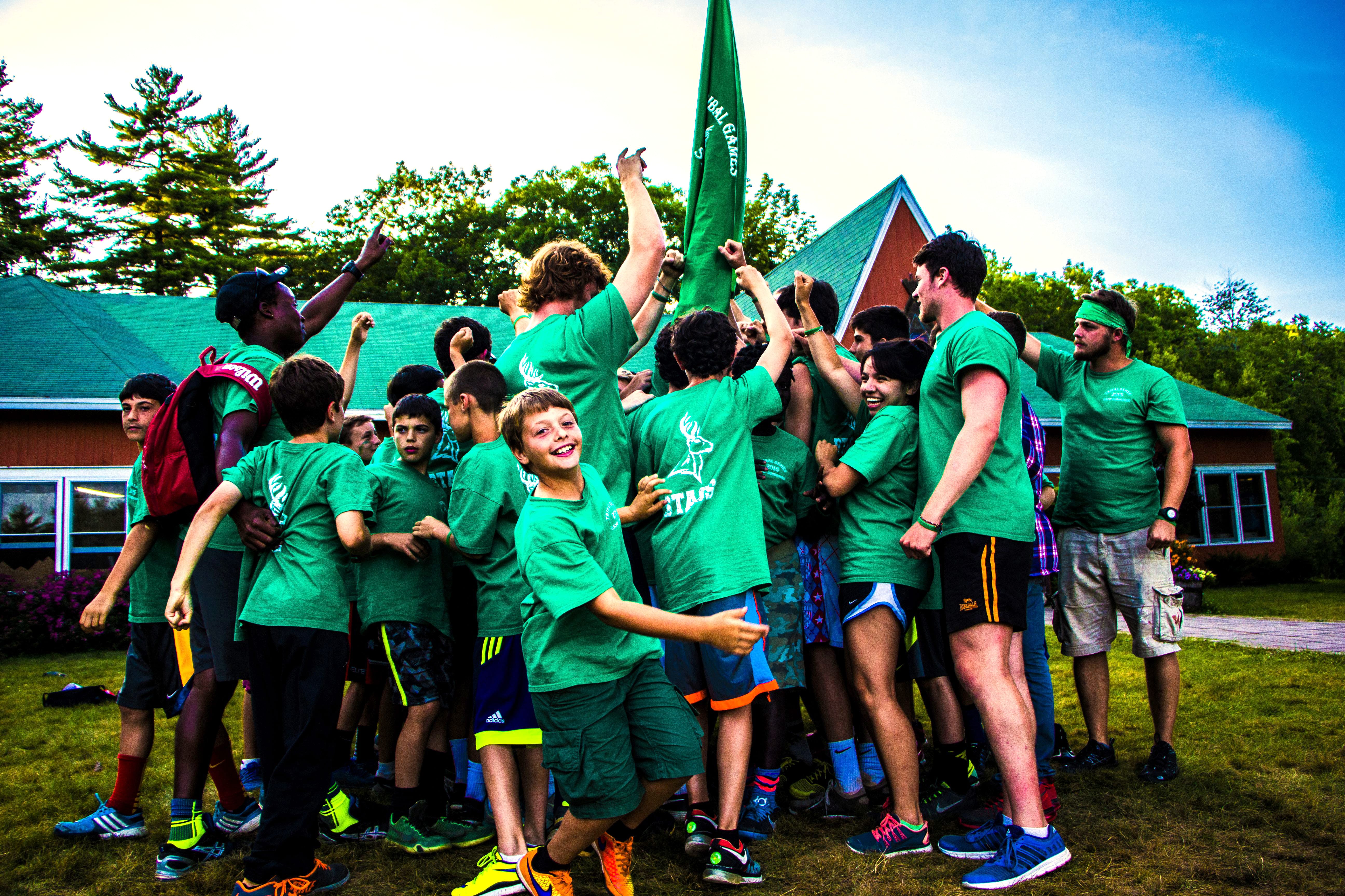 gathering of boys in green group brotherhood