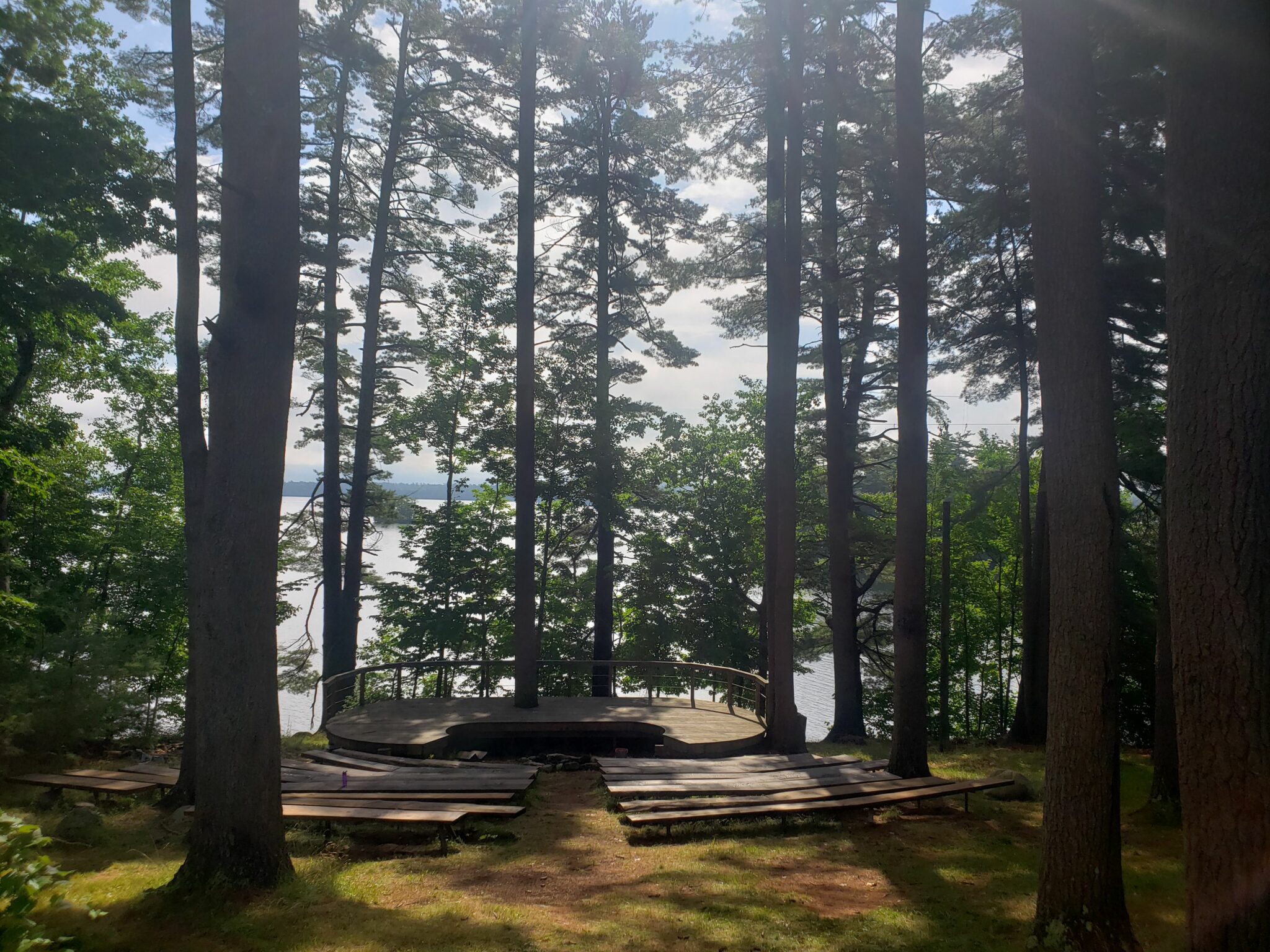Stage and fire bowl during day sun