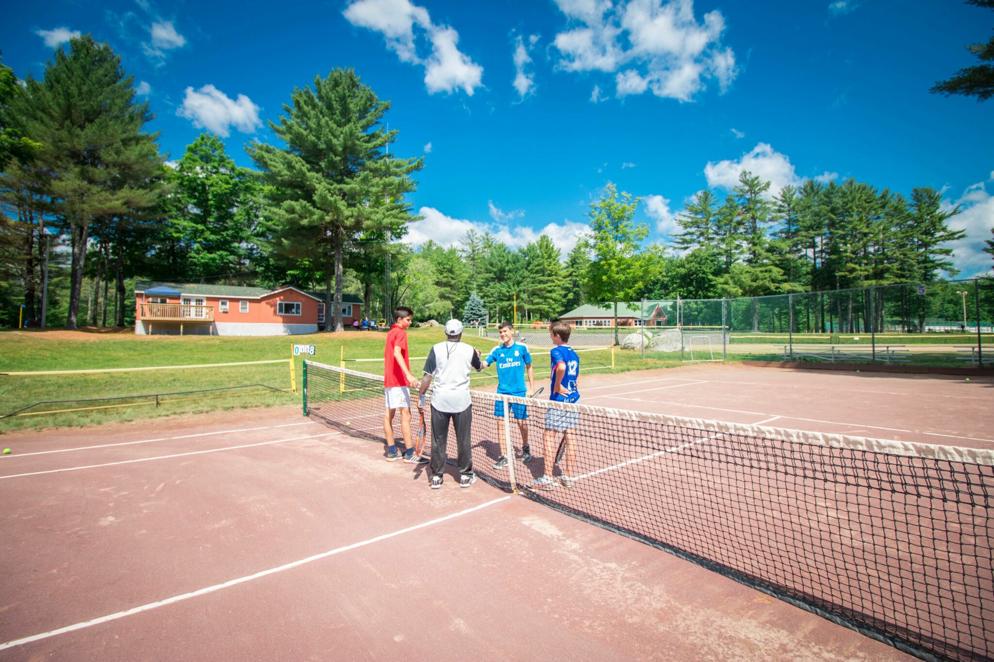 Tennis example clay courts handshake